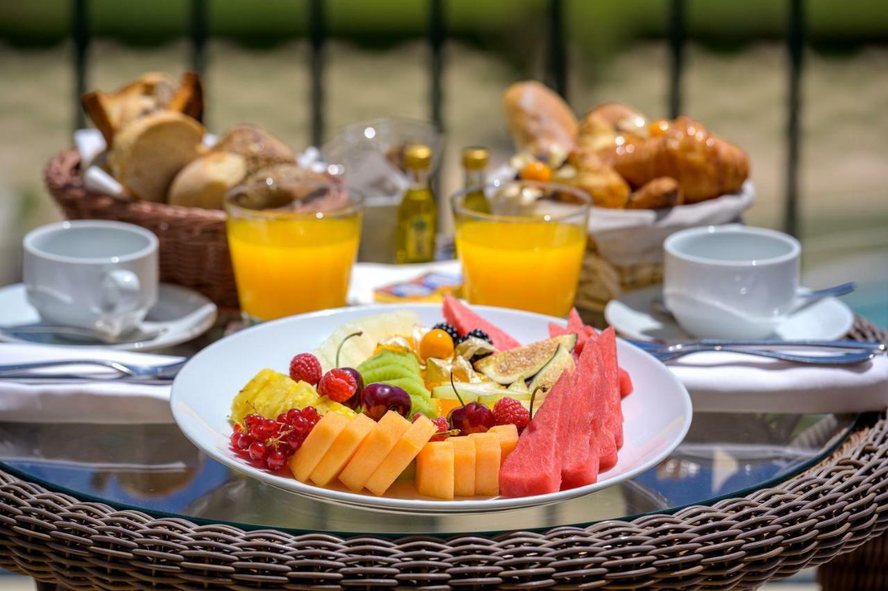 Las Arenas Balneario Resort Valenza Esterno foto Fruit salad