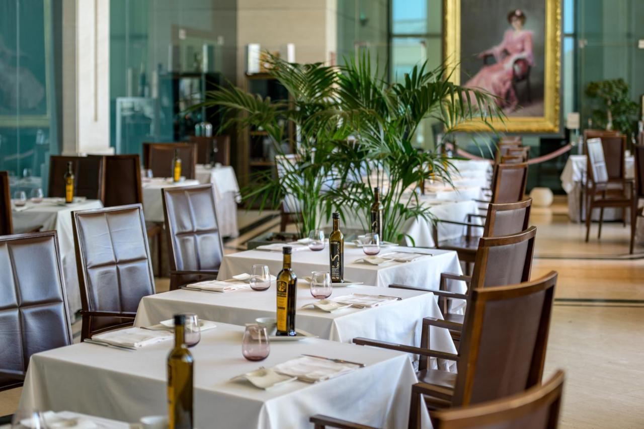 Las Arenas Balneario Resort Valenza Esterno foto Restaurant
